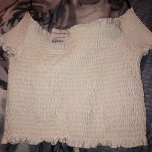 White crop top off the shoulder